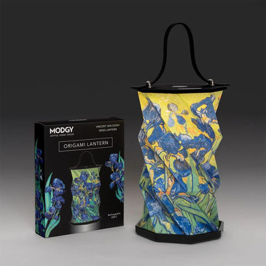 Decorative origami lantern with Van Gogh design next to its packaging on a gradient background