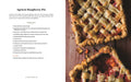 Apricot raspberry pie with a lattice crust on a wooden surface, accompanied by a recipe card.