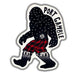 A die-cut sticker featuring a stylized Bigfoot figure in black with white constellation dots, a red and black plaid kilt, and the words 'PORT GAMBLE' curved along the top right, shown on a plain white background.