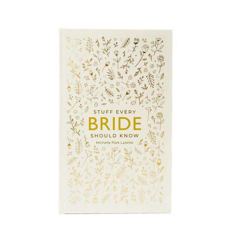 Stuff Every Bride should know by Michelle Park Lazette book cover in white and gold showing a floral pattern on the back