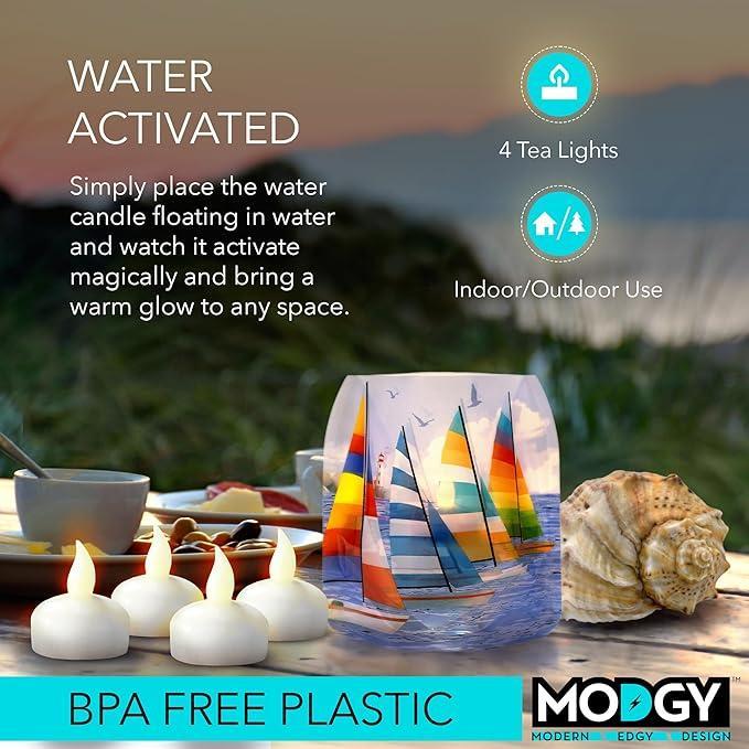 Water activated candle with sailboat design on a table with food and a shell.