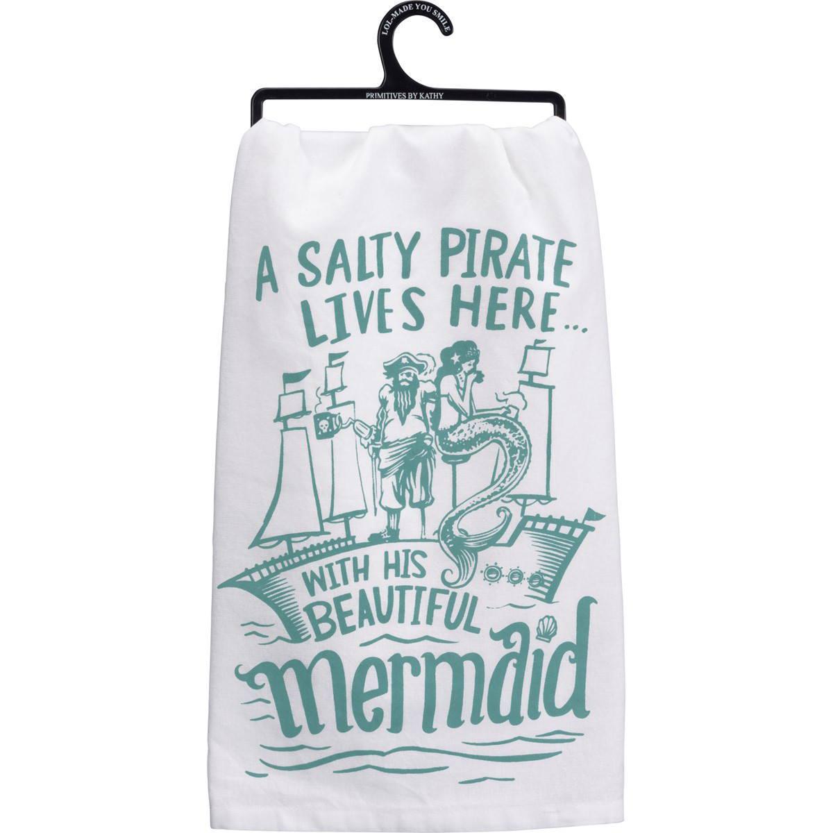 kitchen towel with a pirate-themed design that says "A salty pirate lives here... with his beautiful mermaid" 