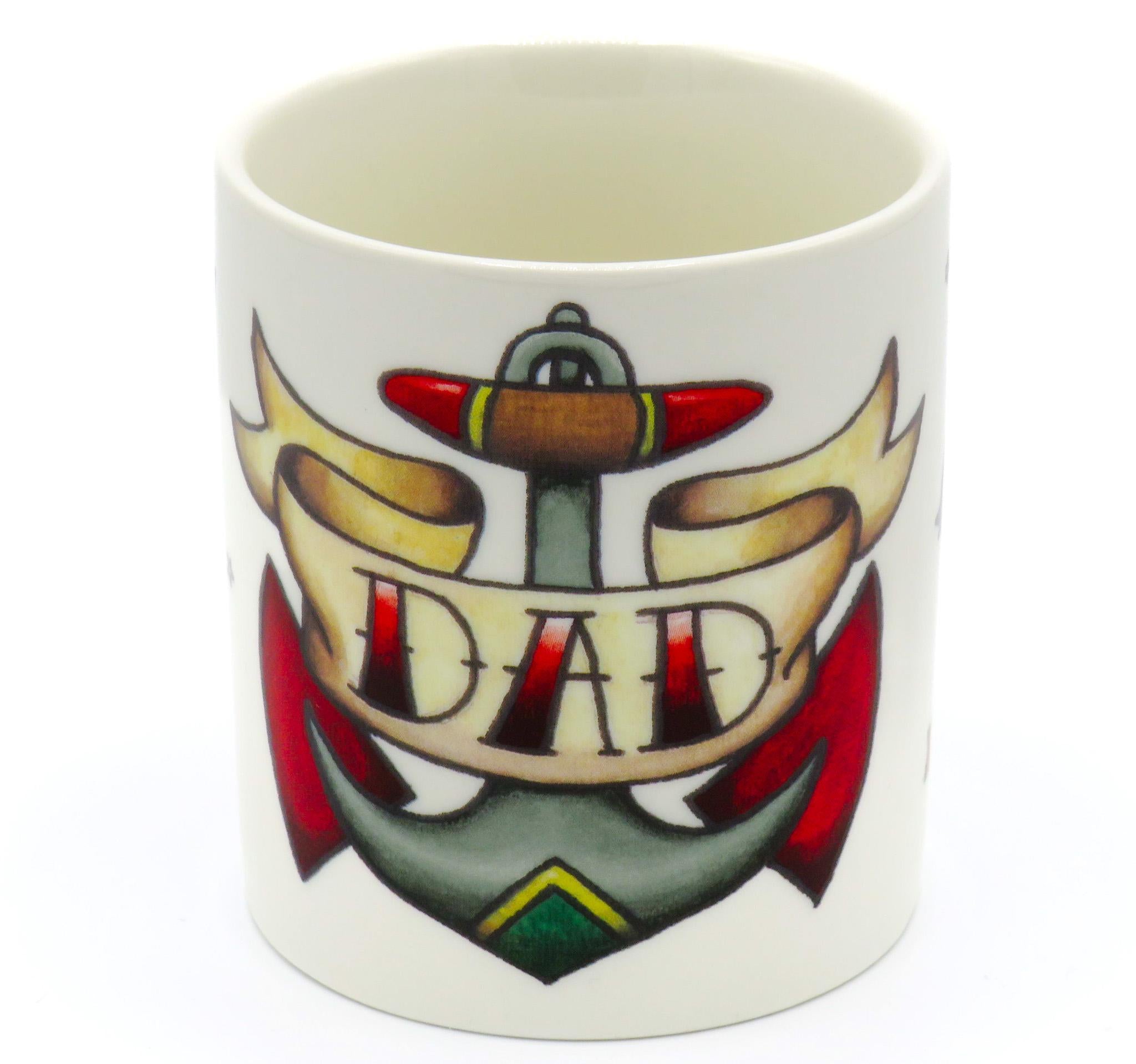  tattoo-style design with the word "Dad" on an anchor,  ivory-colored ceramic mug