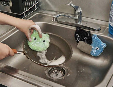 Kitty Scrub Sponges on a kitchen sink